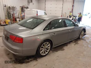 2012 Audi A8 with VIN WAURVAFD7CN021716, listed as a IAAI auction lot 42330229 with 97,359 mi miles and . Bid and sale history available at DreamBid. Image 4.