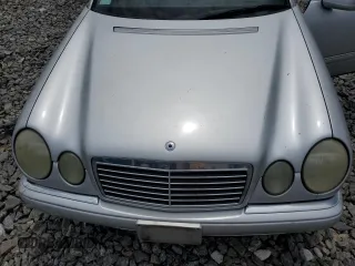 1997 Mercedes-Benz E-Class with VIN WDBJF72F7VA245827, listed as a Copart auction lot 56963154 with 63,162 mi miles and Clean Title. Bid and sale history available at carsss.com. Image 11.