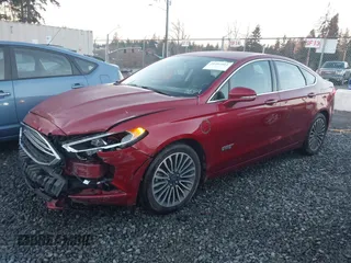 2017 Ford Fusion Energi SE with VIN 3FA6P0PU3HR277659, listed as a IAAI auction lot 41297011 with 119,244 mi miles. Bid and sale history available at carsss.com. Image 19.