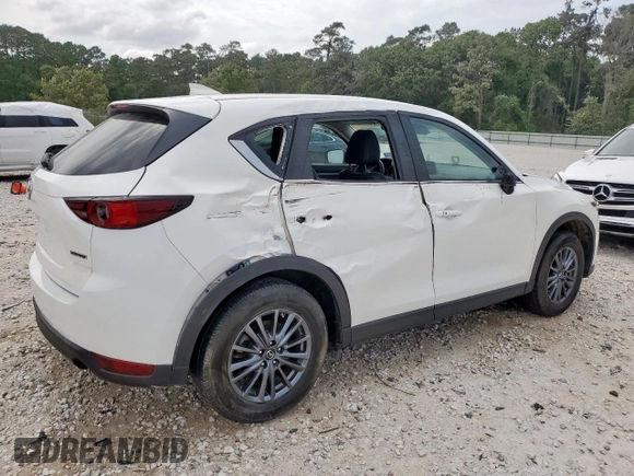 2020 Mazda CX-5 Touring z VIN JM3KFACM6L0787687, wystawiony jako Copart lot #57639555 z przebiegiem 91 219 mil mil oraz Szkoda całkowita • Salvage title. Historia ofert i sprzedaży dostępna na DreamBid. Obrazek 3.