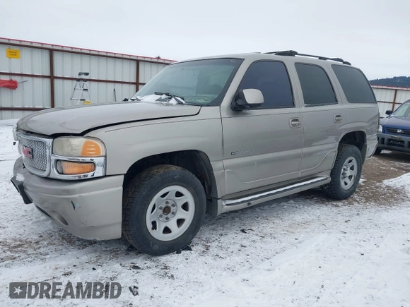 2001 GMC Yukon Denali z VIN 1GKEK63U21J222783, wystawiony jako IAAI lot #41443565 z przebiegiem Nie podano mil oraz . Historia ofert i sprzedaży dostępna na DreamBid. Obrazek 2.