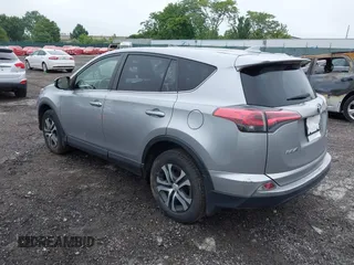 2018 Toyota RAV4 LE with VIN JTMBFREV8JJ200930, listed as a IAAI auction lot 42524876 with 88,015 mi miles and . Bid and sale history available at DreamBid. Image 3.