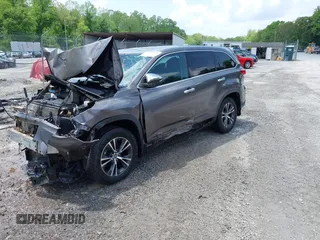 2019 Toyota Highlander LE with VIN 5TDBZRFH5KS722354, listed as a IAAI auction lot 42252775 with 97,141 mi miles and . Bid and sale history available at DreamBid. Image 2.