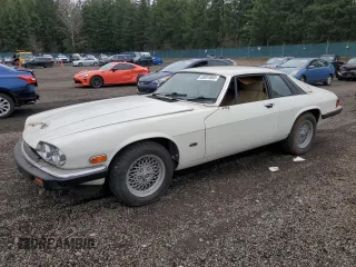 1989 Jaguar XJS z VIN SAJNA5840KC150684, wystawiony jako Copart lot #48081805 z przebiegiem 93 444 mil mil oraz Tytuł czysty. Historia ofert i sprzedaży dostępna na DreamBid. Obrazek 1.