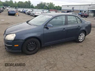 2009 Volkswagen Jetta S with VIN 3VWJZ71K99M139134, listed as a Copart auction lot 56976905 with 128,732 mi miles and Salvage title. Bid and sale history available at DreamBid. Image 1.