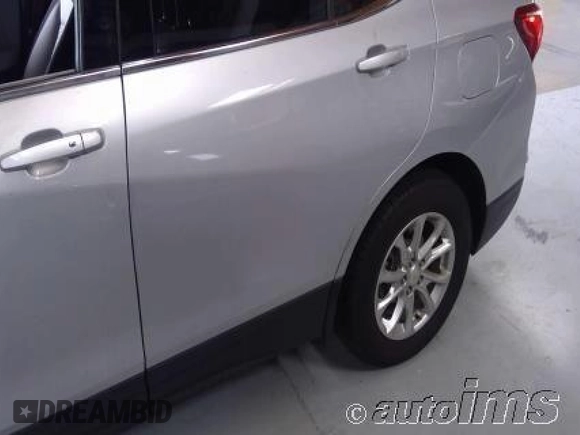 2020 Chevrolet Equinox LT z VIN 2GNAXJEV5L6232137, wystawiony jako IAAI lot #42564889 z przebiegiem 72 940 mil mil oraz . Historia ofert i sprzedaży dostępna na DreamBid. Obrazek 3.