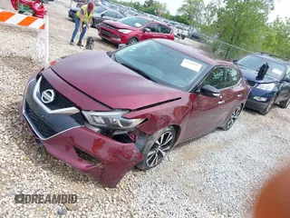 2018 Nissan Maxima SL with VIN 1N4AA6AP2JC369187, listed as a IAAI auction lot 39418297 with Not provided miles and . Bid and sale history available at DreamBid. Image 17.