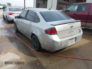 2011 Ford Focus SES with VIN 1FAHP3GN2BW196398, listed as a IAAI auction lot 41940344 with 116,482 mi miles. Bid and sale history available at carsss.com. Image 3.