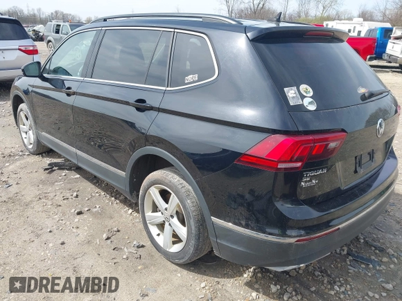 2021 Volkswagen Tiguan SE with VIN 3VV2B7AX4MM050282, listed as a IAAI auction lot 42124808 with 80,082 mi miles and . Bid and sale history available at DreamBid. Image 3.