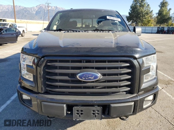 2015 Ford F-150 XLT with VIN 1FTEW1EP9FKE90564, listed as a Copart auction lot 50532105 with 123,494 mi miles and Salvage title. Bid and sale history available at DreamBid. Image 5.