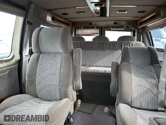 1999 Ford Econoline Cargo with VIN 1FDRE14W6XHA56562, listed as a Copart auction lot 75185804 with 153,673 mi miles and Clean Title. Bid and sale history available at carsss.com. Image 10.