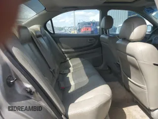 2000 Nissan Maxima GXE z VIN JN1CA31A9YT224416, wystawiony jako Copart lot #55514495 z przebiegiem 234 882 mil mil oraz Szkody całkowita. Historia ofert i sprzedaży dostępna na DreamBid. Obrazek 10.