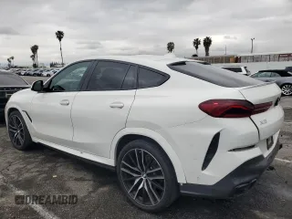 2022 BMW X6 xDrive40i z VIN 5UXCY6C08N9J21980, wystawiony jako Copart lot #48819745 z przebiegiem 24 431 mil mil oraz Szkoda całkowita • Salvage title. Historia ofert i sprzedaży dostępna na DreamBid. Obrazek 2.