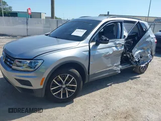 2020 Volkswagen Tiguan SE with VIN 3VV3B7AX8LM077472, listed as a IAAI auction lot 41933521 with 52,028 mi miles and . Bid and sale history available at DreamBid. Image 17.