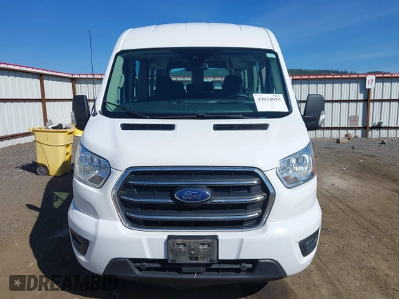 2020 Ford Transit Passenger XL with VIN 1FBAX2C85LKA42853, listed as a IAAI auction lot 42034055 with 65,181 mi miles and . Bid and sale history available at DreamBid. Image 12.