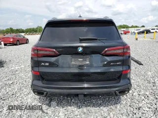 2023 BMW X5 xDrive40i with VIN 5UXCR6C07P9R18608, listed as a Copart auction lot 55911595 with Not provided miles and Salvage title. Bid and sale history available at DreamBid. Image 6.
