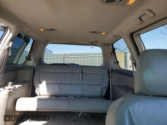 2004 Honda Odyssey EX-L with VIN 5FNRL18994B117140, listed as a Copart auction lot 49677635 with 247,237 mi miles and Salvage Title. Bid and sale history available at DreamBid. Image 10.