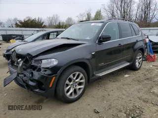 2013 BMW X5 xDrive35i with VIN 5UXZV4C59D0E09161, listed as a Copart auction lot 52372115 with 117,719 mi miles and Salvage Title. Bid and sale history available at carsss.com. Image 1.