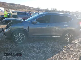 2019 Nissan Rogue SL with VIN 5N1AT2MT5KC758845, listed as a IAAI auction lot 41156455 with 95,335 mi miles and . Bid and sale history available at DreamBid. Image 13.