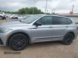 2022 Volkswagen Tiguan SE R-Line Black with VIN 3VVCB7AXXNM165748, listed as a IAAI auction lot 42178772 with 64,007 mi miles and . Bid and sale history available at DreamBid. Image 14.