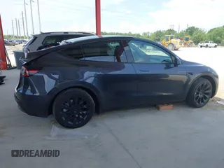 2024 Tesla Model Y Long Range z VIN 7SAYGDEE7RA229591, wystawiony jako IAAI lot #42194044 z przebiegiem 22 866 mil mil oraz . Historia ofert i sprzedaży dostępna na DreamBid. Obrazek 13.