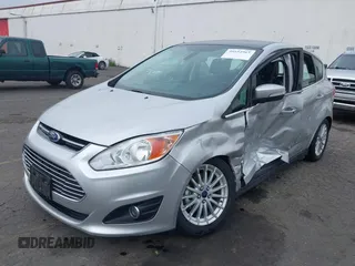 2014 Ford C-Max SEL z VIN 1FADP5BU7EL511677, wystawiony jako IAAI lot #40554962 z przebiegiem 63 031 mil mil oraz . Historia ofert i sprzedaży dostępna na DreamBid. Obrazek 2.