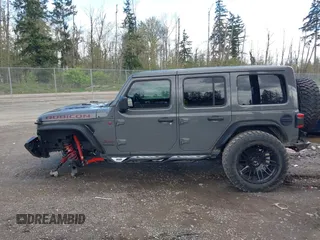 2021 Jeep Wrangler Unlimited Rubicon with VIN 1C4HJXFG9MW531858, listed as a IAAI auction lot 42001095 with 38,240 mi miles and . Bid and sale history available at DreamBid. Image 14.