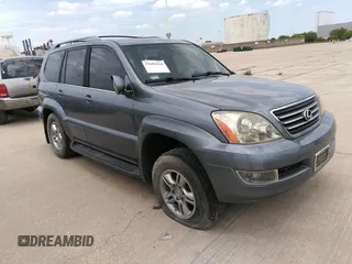 2005 Lexus GX 470 with VIN JTJBT20X750075565, listed as a IAAI auction lot 38765821 with 145,652 mi miles. Bid and sale history available at carsss.com. Image 1.