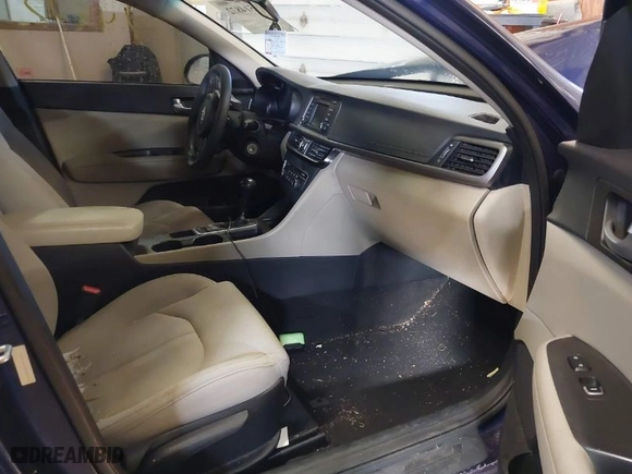 2016 Kia Optima LX with VIN 5XXGT4L33GG026572, listed as a IAAI auction lot 41514872 with 135,423 mi miles. Bid and sale history available at carsss.com. Image 5.