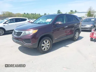 2011 Kia Sorento LX with VIN 5XYKTCA19BG008104, listed as a IAAI auction lot 42250877 with 121,288 mi miles and . Bid and sale history available at DreamBid. Image 2.