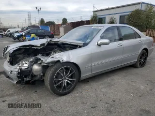 2002 Mercedes-Benz S-Class 4.3L with VIN WDBNG70J62A257551, listed as a Copart auction lot 84096614 with 113,860 mi miles and Salvage Title. Bid and sale history available at carsss.com. Image 1.