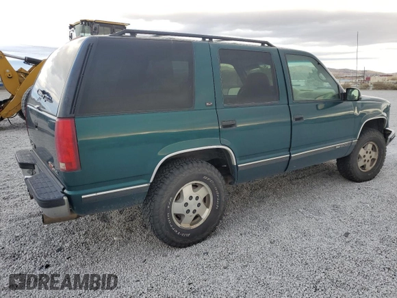 1996 GMC Yukon with VIN 1GKEK13R6TJ747606, listed as a Copart auction lot 80763434 with 308,837 mi miles and Salvage Title. Bid and sale history available at DreamBid. Image 3.