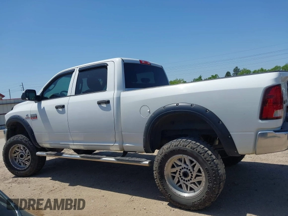 2012 Ram 2500 ST z VIN 3C6UD5CLXCG301343, wystawiony jako IAAI lot #42009239 z przebiegiem 139 514 mil mil oraz . Historia ofert i sprzedaży dostępna na DreamBid. Obrazek 14.