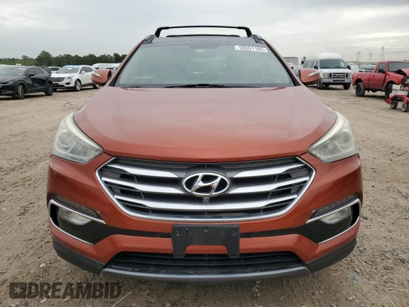 2017 Hyundai Santa Fe 2.4L z VIN 5XYZUDLB6HG411375, wystawiony jako Copart lot #50551165 z przebiegiem 35 597 mil mil oraz Czysty tytuł • Clean title. Historia ofert i sprzedaży dostępna na DreamBid. Obrazek 5.