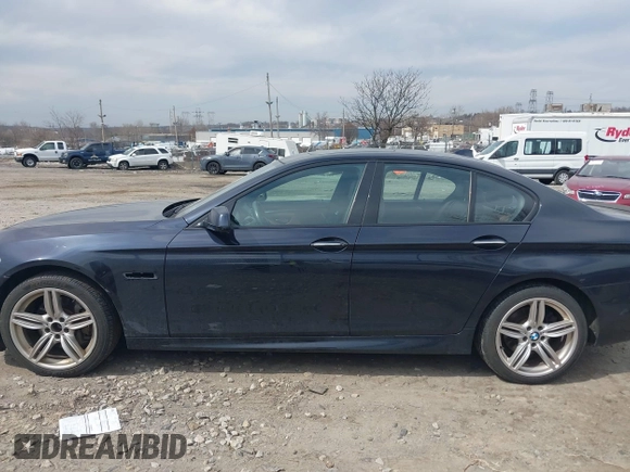 2013 BMW 5 Series 535i xDrive with VIN WBAFU7C51DDU75974, listed as a IAAI auction lot 41837789 with 216,394 mi miles and . Bid and sale history available at carsss.com. Image 13.
