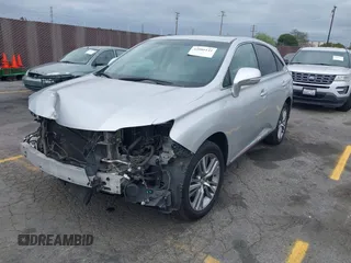 2015 Lexus RX 450h with VIN 2T2ZB1BA1FC002346, listed as a IAAI auction lot 42086141 with 160,775 mi miles and . Bid and sale history available at DreamBid. Image 2.