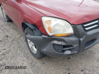 2006 Kia Sportage LX z VIN KNDJF723367282007, wystawiony jako IAAI lot #41214330 z przebiegiem 168 793 mil mil oraz . Historia ofert i sprzedaży dostępna na DreamBid. Obrazek 6.