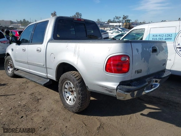 2001 Ford F-150 SuperCrew XLT with VIN 1FTRW07L11KB56494, listed as a IAAI auction lot 41623355 with 240,410 mi miles. Bid and sale history available at carsss.com. Image 3.