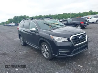 2019 Subaru Ascent Touring z VIN 4S4WMARD9K3464850, wystawiony jako IAAI lot #42330817 z przebiegiem 90 843 mil mil oraz . Historia ofert i sprzedaży dostępna na DreamBid. Obrazek 1.