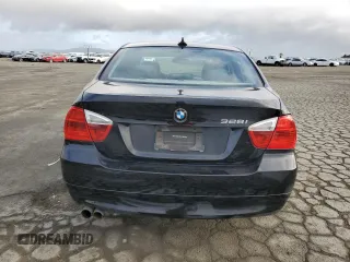2007 BMW 3 Series 328i with VIN WBAVA37507NL12948, listed as a Copart auction lot 50275915 with 357,156 mi miles and Salvage title. Bid and sale history available at DreamBid. Image 6.