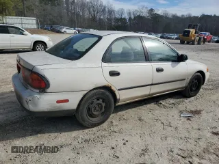 1998 Mazda Protege DX z VIN JM1BC1416W0194406, wystawiony jako Copart lot #44535955 z przebiegiem 312 942 mil mil oraz Szkoda całkowita • Salvage title. Historia ofert i sprzedaży dostępna na DreamBid. Obrazek 3.