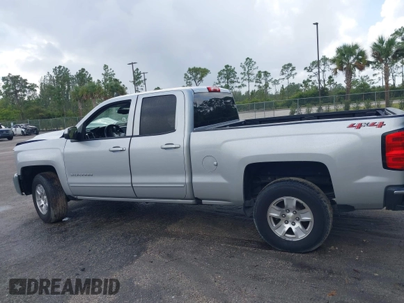2019 Chevrolet Silverado 1500 LT with VIN 2GCVKPECXK1158607, listed as a IAAI auction lot 41116624 with 72,822 mi miles and . Bid and sale history available at DreamBid. Image 14.