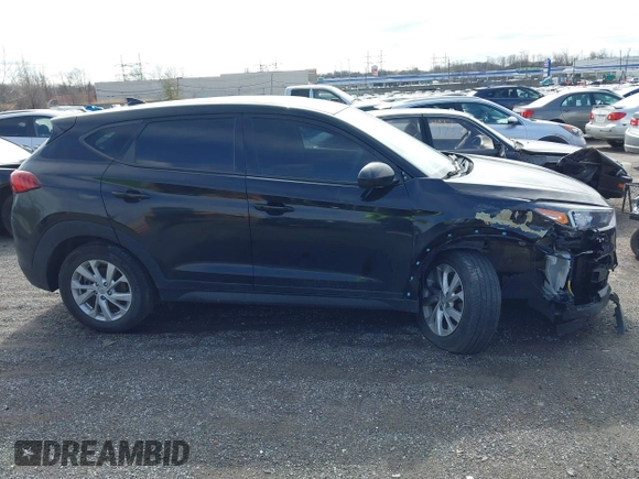 2019 Hyundai Tucson SE with VIN KM8J2CA46KU977863, listed as a IAAI auction lot 41704318 with 23,076 mi miles. Bid and sale history available at carsss.com. Image 13.