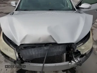 2013 Buick LaCrosse Premium 1 z VIN 1G4GF5E33DF170154, wystawiony jako Copart lot #59536615 z przebiegiem 213 717 mil mil oraz Szkoda całkowita • Salvage title. Historia ofert i sprzedaży dostępna na DreamBid. Obrazek 11.