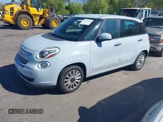 2014 FIAT 500L Easy with VIN ZFBCFABH9EZ010519, listed as a IAAI auction lot 42150633 with 60,724 mi miles. Bid and sale history available at carsss.com. Image 2.