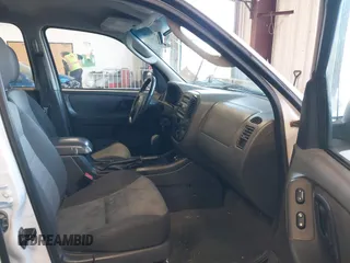 2006 Ford Escape XLS z VIN 1FMCU92Z16KC62653, wystawiony jako IAAI lot #42036057 z przebiegiem 214 465 mil mil oraz . Historia ofert i sprzedaży dostępna na DreamBid. Obrazek 5.