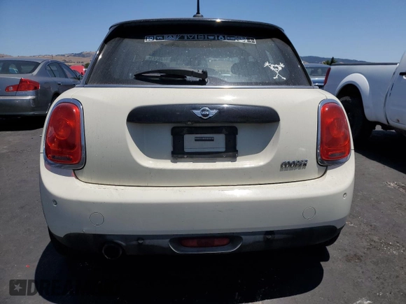 2017 MINI Hardtop 4 Door Cooper with VIN WMWXU1C32H2F77790, listed as a Copart auction lot 62352415 with 71,661 mi miles and Salvage title. Bid and sale history available at DreamBid. Image 6.