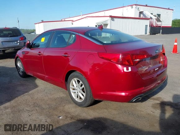 2012 Kia Optima LX with VIN 5XXGM4A76CG027180, listed as a IAAI auction lot 42143209 with 175,028 mi miles and . Bid and sale history available at carsss.com. Image 3.