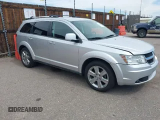 2010 Dodge Journey SXT with VIN 3D4PH5FV3AT261590, listed as a IAAI auction lot 42054460 with 138,424 mi miles. Bid and sale history available at carsss.com. Image 1.