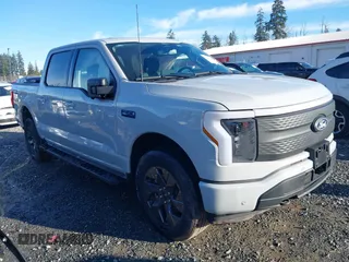 2024 Ford F-150 Lightning Flash with VIN 1FT6W3L71RWG17002, listed as a IAAI auction lot 41279806 with 4,595 mi miles and . Bid and sale history available at DreamBid. Image 1.